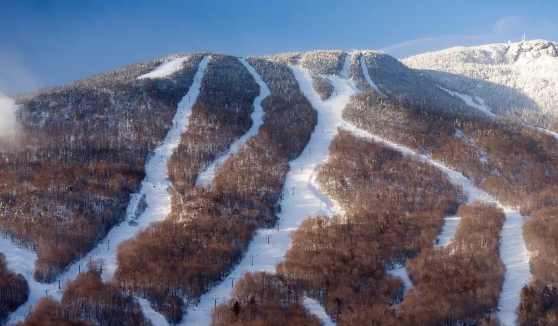 Is skiing better in Vermont or Maine?
